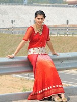 Tapsee in Red Saree Stills